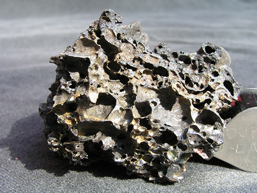 %_tempFileName0748_Reticulite_KilaueaIki_HI%