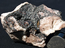 %_tempFileName0252_Molybdenite_EdnaMtn_NV%